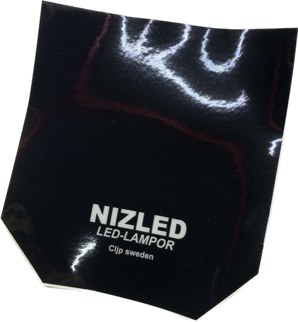 Nizled dekal till lamp-plåt Husqvarna -23 svart